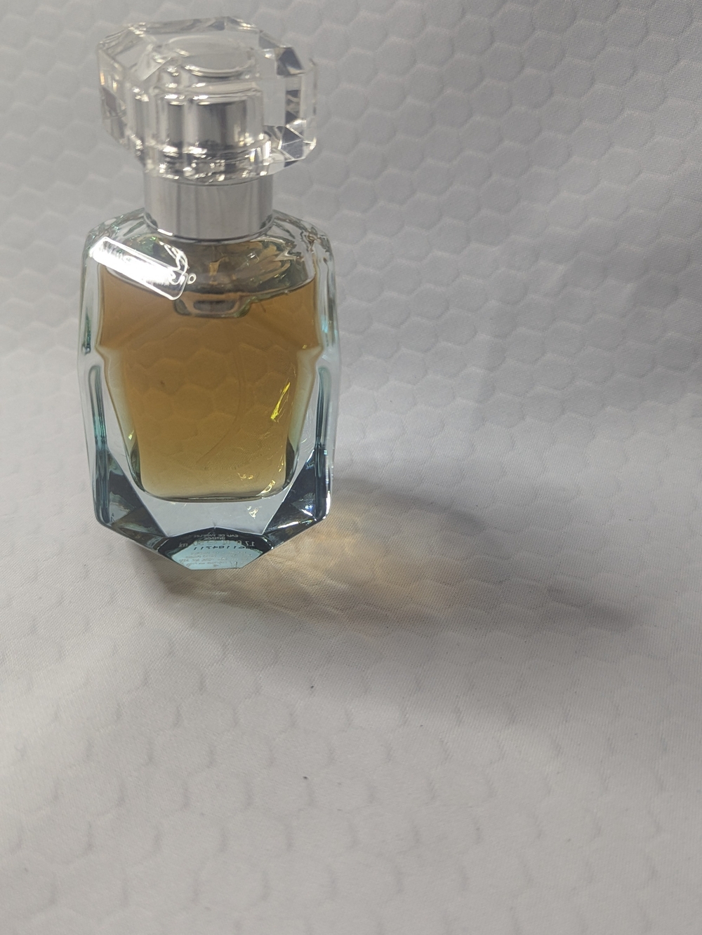 Faceted Glass Perfume Bottle with Amber Fragrance